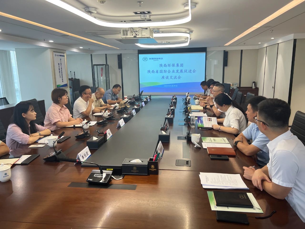 永利yl65335集团与陕西省国防企业生长增进会座谈交流